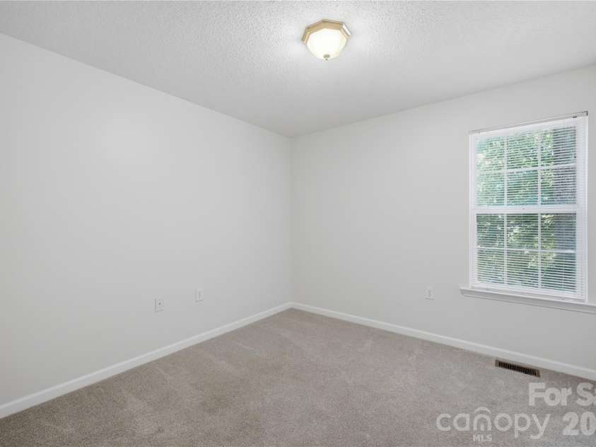 147 Valley Glen Drive, Troutman, NC 28166.  MLS# CAR4400282, YatesRealty ID 40969. Secondary bed 2