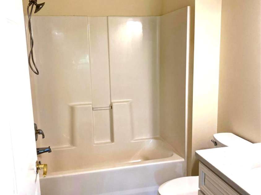 5750 Oyster Catcher Drive, North Myrtle Beach, SC 29582.  MLS# CAR4409792, YatesRealty ID 40974. Primary ensuite bath