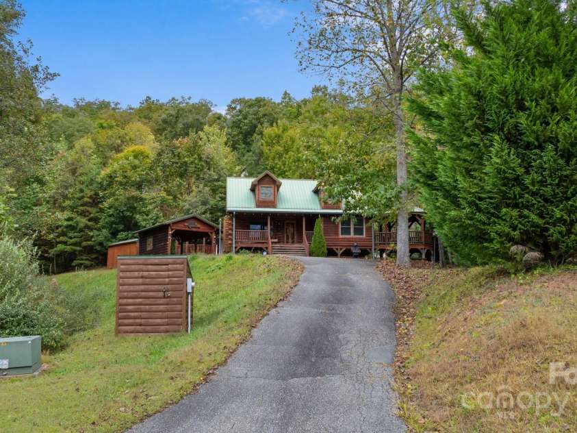 80 Slow Lane, Whittier, NC 28789.  MLS# CAR4307656, YatesRealty ID 4098. House from bottom of driveway