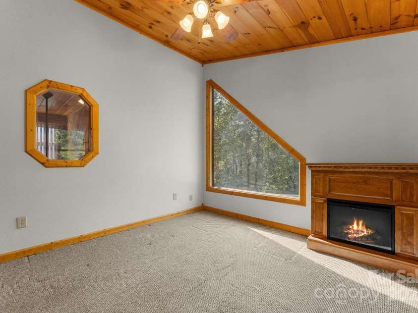 80 Slow Lane, Whittier, NC 28789.  MLS# CAR4307656, YatesRealty ID 4098. Upstairs bedroom to the left of stairs