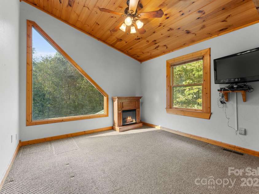 80 Slow Lane, Whittier, NC 28789.  MLS# CAR4307656, YatesRealty ID 4098. Upstairs bedroom to the left of stairs