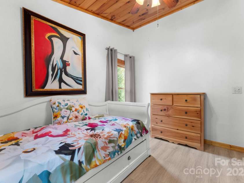 80 Slow Lane, Whittier, NC 28789.  MLS# CAR4307656, YatesRealty ID 4098. Upstairs bedroom to the right of stairs