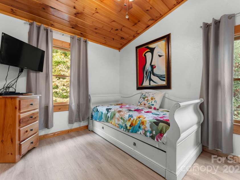 80 Slow Lane, Whittier, NC 28789.  MLS# CAR4307656, YatesRealty ID 4098. Upstairs bedtoom to the right of stairs