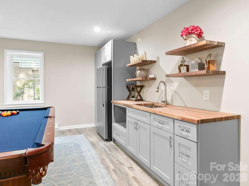 139 Kammerer Drive, Waynesville, NC 28785.  MLS# CAR4377937, YatesRealty ID 40981. Basement Den
