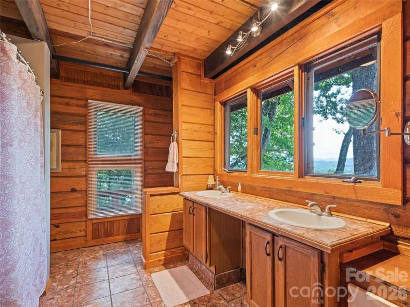 770 Shelton Cove Road, Waynesville, NC 28785.  MLS# CAR4409581, YatesRealty ID 40983. Full bathroom main level
