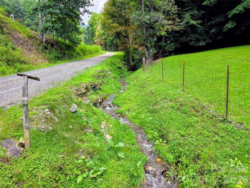 98 Will Wilson Road, Burnsville, NC 28714.  MLS# CAR4406870, YatesRealty ID 40987. Charlie's Creek