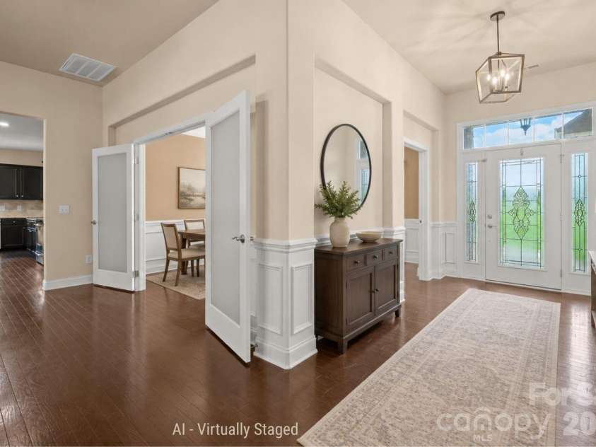 589 Shepherd Road, Troutman, NC 28166.  MLS# CAR4405314, YatesRealty ID 40988. Dining room and entry way - virtually staged