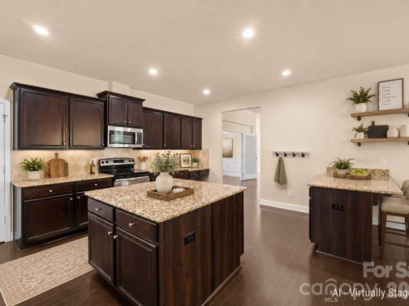 589 Shepherd Road, Troutman, NC 28166.  MLS# CAR4405314, YatesRealty ID 40988. Kitchen w/island and breakfast bar - virtually staged