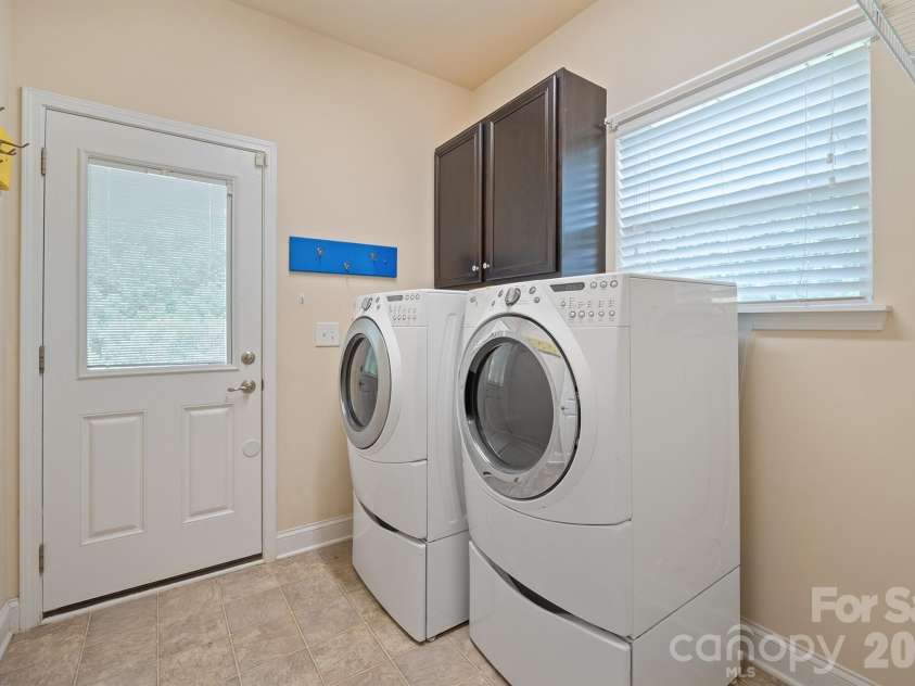 589 Shepherd Road, Troutman, NC 28166.  MLS# CAR4405314, YatesRealty ID 40988. Laundry/mud room off back patio