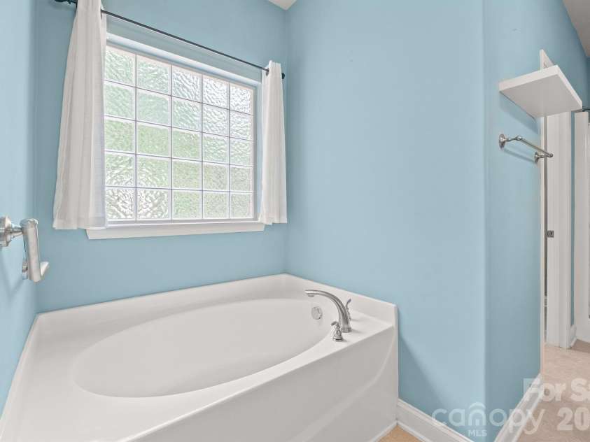 589 Shepherd Road, Troutman, NC 28166.  MLS# CAR4405314, YatesRealty ID 40988. Primary bathroom