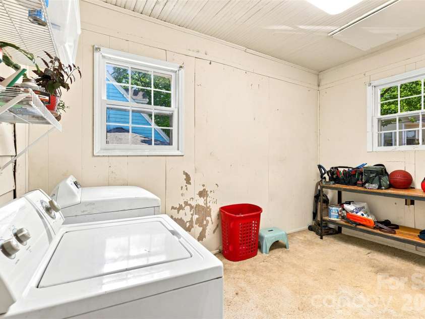704 Washington Street, Shelby, NC 28150.  MLS# CAR4407611, YatesRealty ID 40996. Laundry ans Storage Room on Main