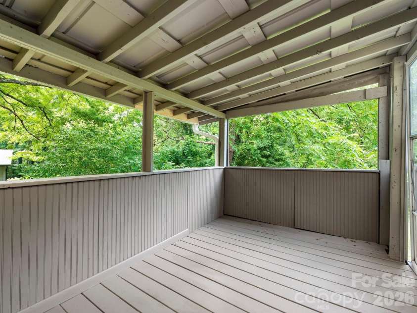 57 Dale Street, Asheville, NC 28806.  MLS# CAR4408742, YatesRealty ID 41003. Covered porch off kitchen
