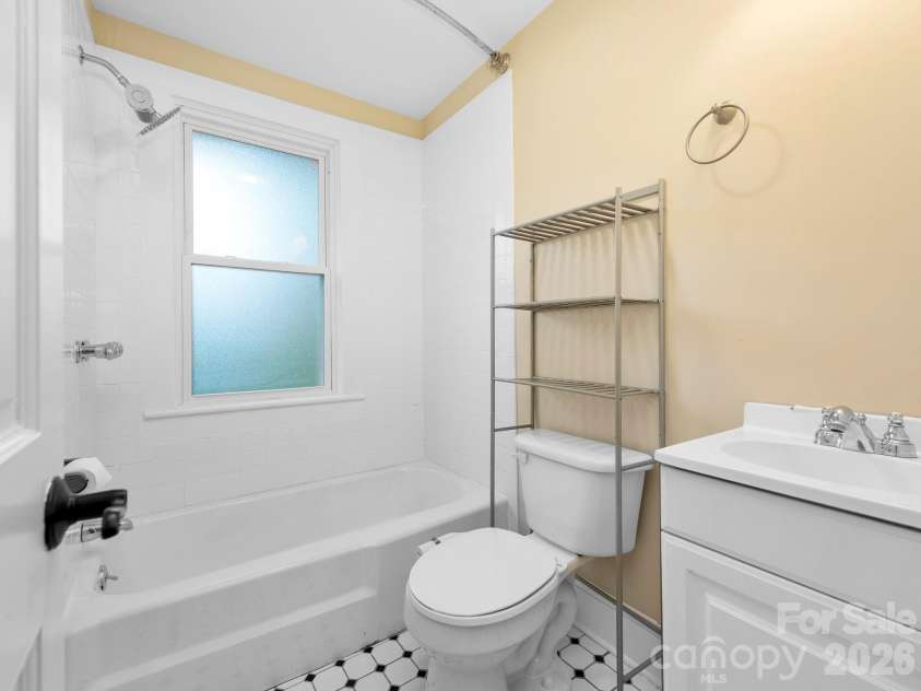 57 Dale Street, Asheville, NC 28806.  MLS# CAR4408742, YatesRealty ID 41003. Full BA between BRs 2 and 3