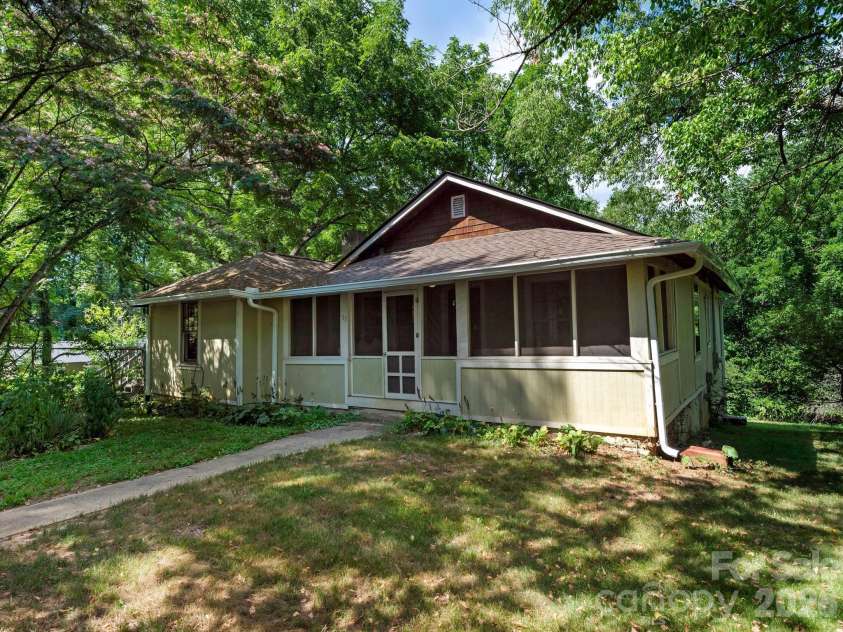 57 Dale Street, Asheville, NC 28806.  MLS# CAR4408742, YatesRealty ID 41003. Mostly fenced front yard