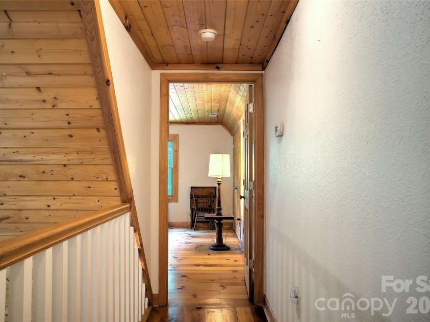 3815 Bat Cave Road, Old Fort, NC 28762.  MLS# CAR4404571, YatesRealty ID 41006. Two generously sized bedrooms upstairs