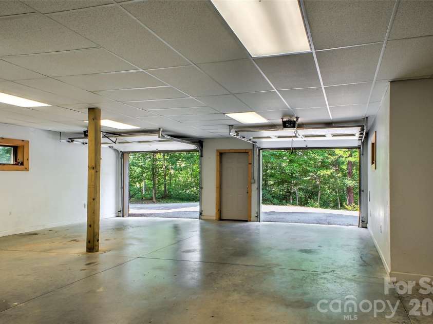 3815 Bat Cave Road, Old Fort, NC 28762.  MLS# CAR4404571, YatesRealty ID 41006. Very large garage