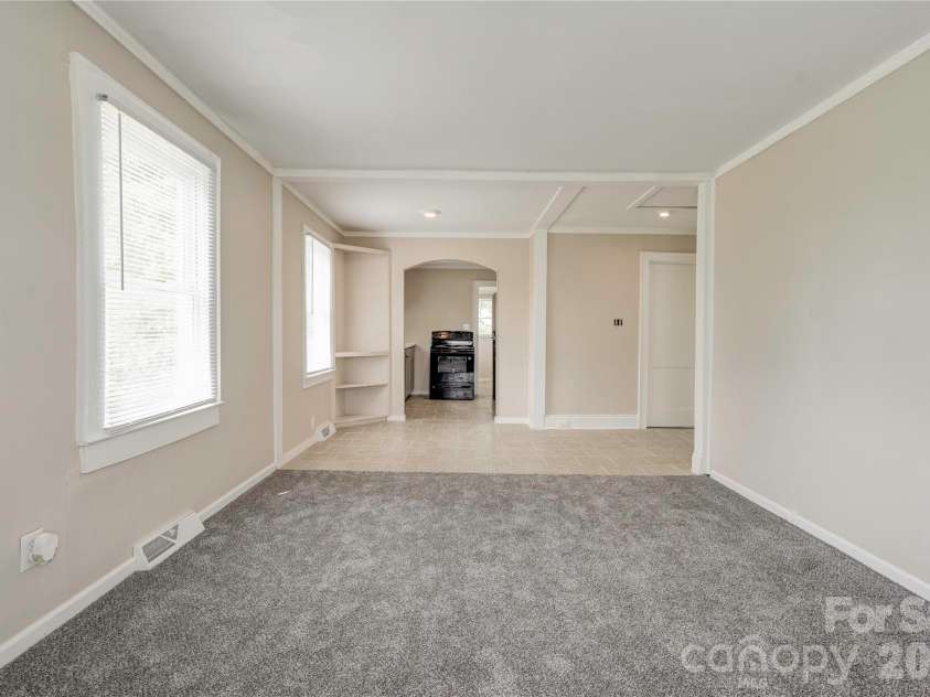 3837 Harris Creek Road, Lawndale, NC 28090.  MLS# CAR4406969, YatesRealty ID 41009. Living Room/Dining/Kitchen