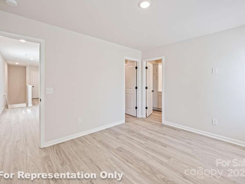 166 Sycamore Street, Mooresville, NC 28115.  MLS# CAR4231441, YatesRealty ID 4101. Primary Bedroom