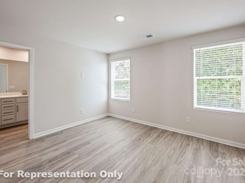 166 Sycamore Street, Mooresville, NC 28115.  MLS# CAR4231441, YatesRealty ID 4101. Primary Bedroom