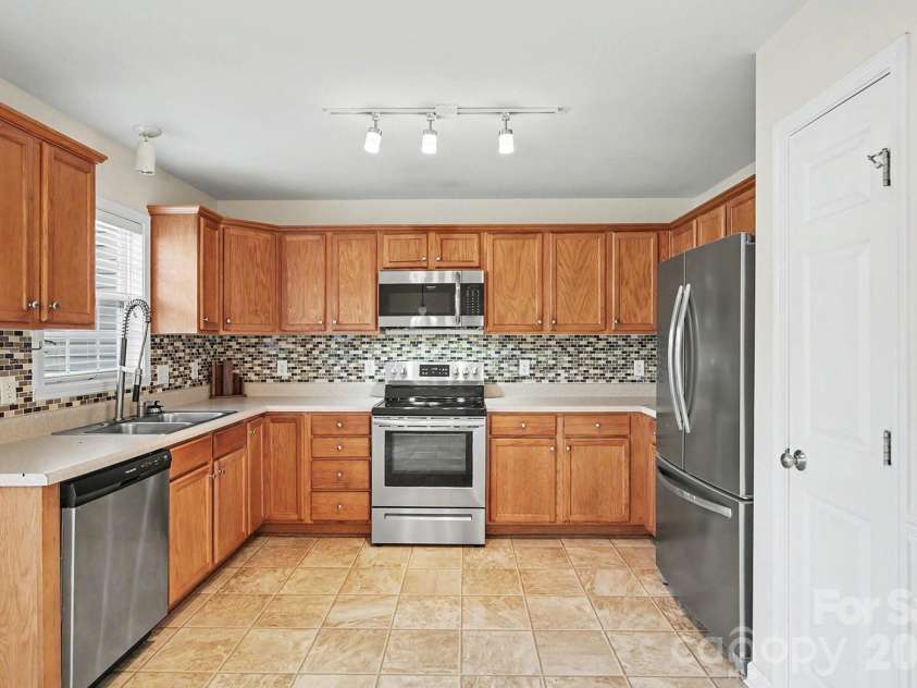 3707 Spanish Peak Drive, High Point, NC 27265.  MLS# CAR4407793, YatesRealty ID 41011. 