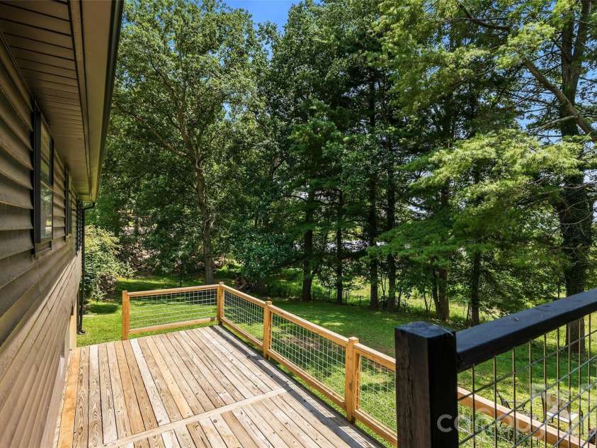 75 Old Macedonia Road, Alexander, NC 28701.  MLS# CAR4408770, YatesRealty ID 41014. Back deck