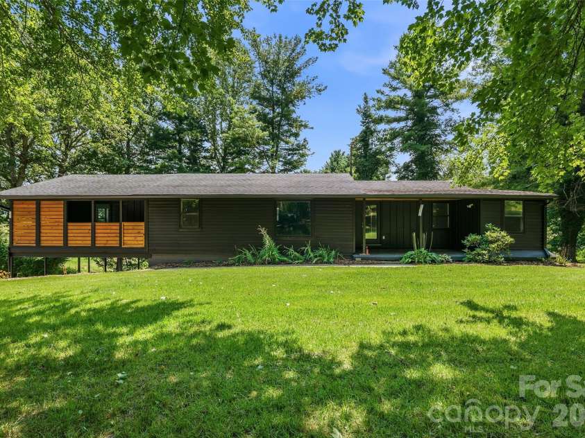 75 Old Macedonia Road, Alexander, NC 28701.  MLS# CAR4408770, YatesRealty ID 41014. Classic charming mid century curb appeal with a modern update