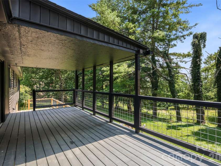 75 Old Macedonia Road, Alexander, NC 28701.  MLS# CAR4408770, YatesRealty ID 41014. Covered back deck with access to the lower deck and back yard