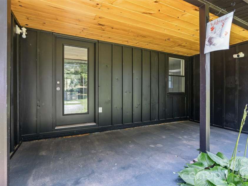 75 Old Macedonia Road, Alexander, NC 28701.  MLS# CAR4408770, YatesRealty ID 41014. Covered front porch
