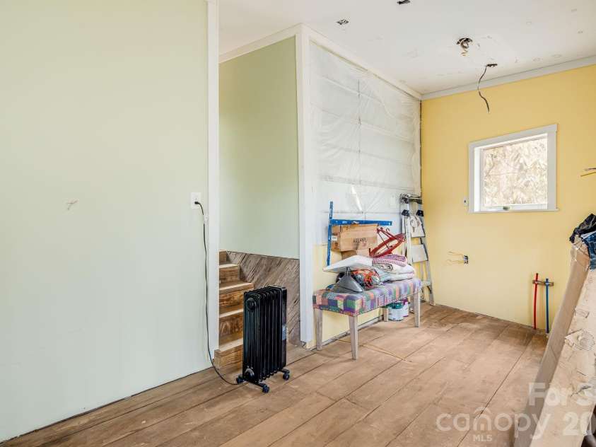 55 Heavenly Lane, Fairview, NC 28730.  MLS# CAR4341248, YatesRealty ID 4103. Inside tiny home