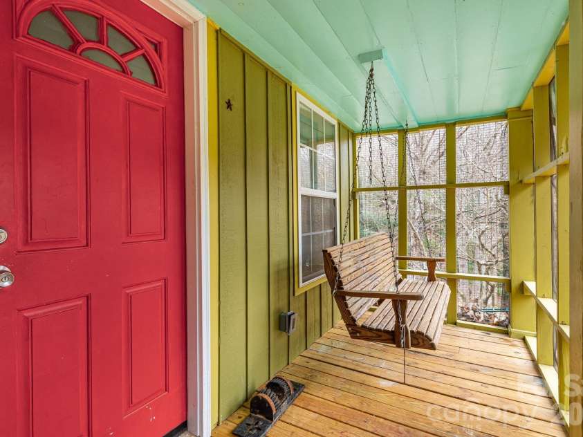 55 Heavenly Lane, Fairview, NC 28730.  MLS# CAR4341248, YatesRealty ID 4103. Screened in porch