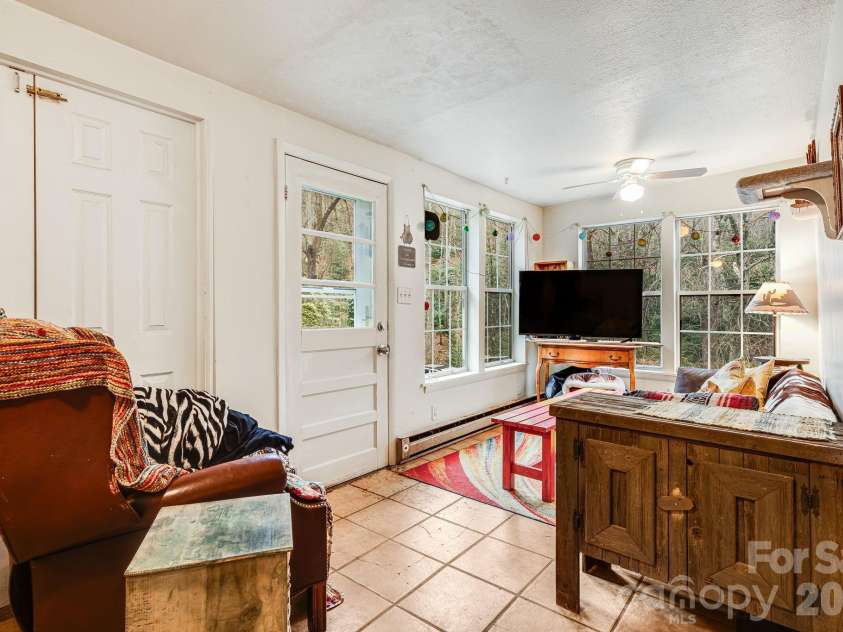 55 Heavenly Lane, Fairview, NC 28730.  MLS# CAR4341248, YatesRealty ID 4103. Second living space near rear of home