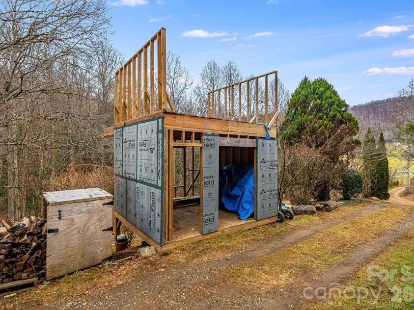 55 Heavenly Lane, Fairview, NC 28730.  MLS# CAR4341248, YatesRealty ID 4103. Unfinished outbuilding