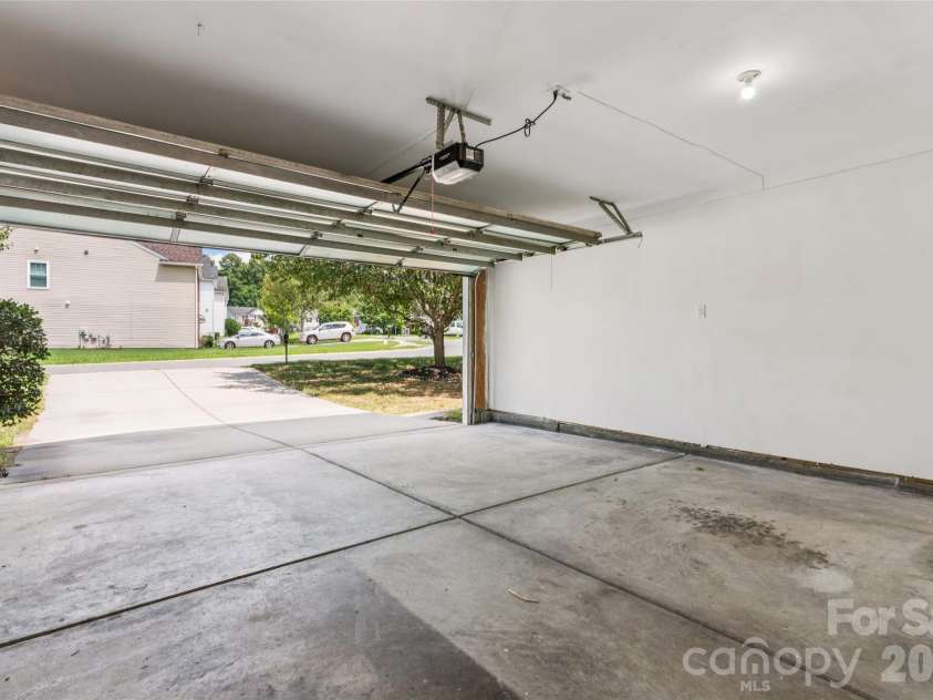 7305 Larwill Lane, Charlotte, NC 28216.  MLS# CAR4409248, YatesRealty ID 41039. Garage