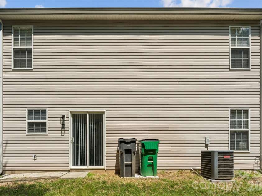 7305 Larwill Lane, Charlotte, NC 28216.  MLS# CAR4409248, YatesRealty ID 41039. Rear Exterior