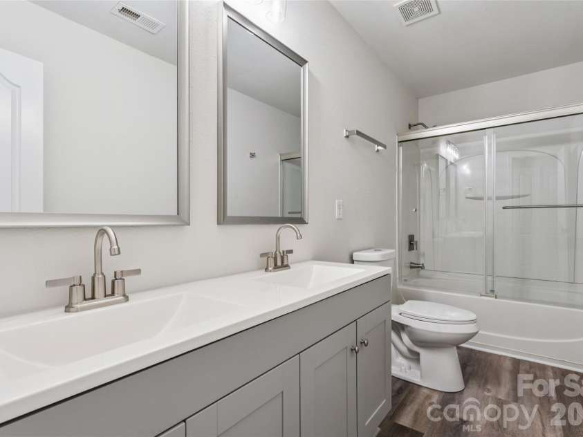 7305 Larwill Lane, Charlotte, NC 28216.  MLS# CAR4409248, YatesRealty ID 41039. Secondary Bathroom