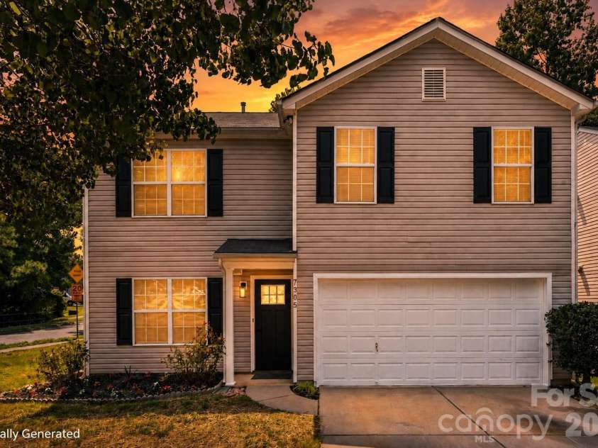 7305 Larwill Lane, Charlotte, NC 28216.  MLS# CAR4409248, YatesRealty ID 41039. Sunset at 7305 Larwill