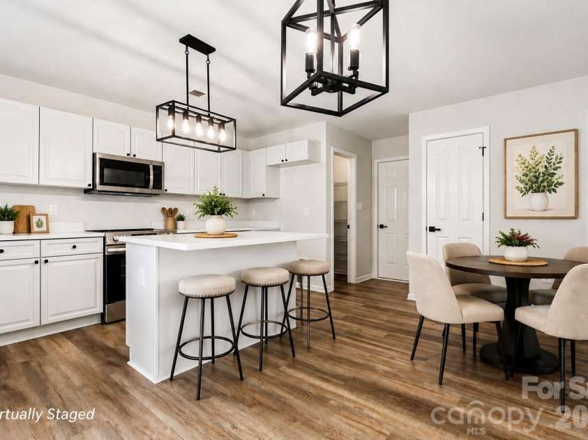 7305 Larwill Lane, Charlotte, NC 28216.  MLS# CAR4409248, YatesRealty ID 41039. Virtually Staged Kitchen and Breakfast Area