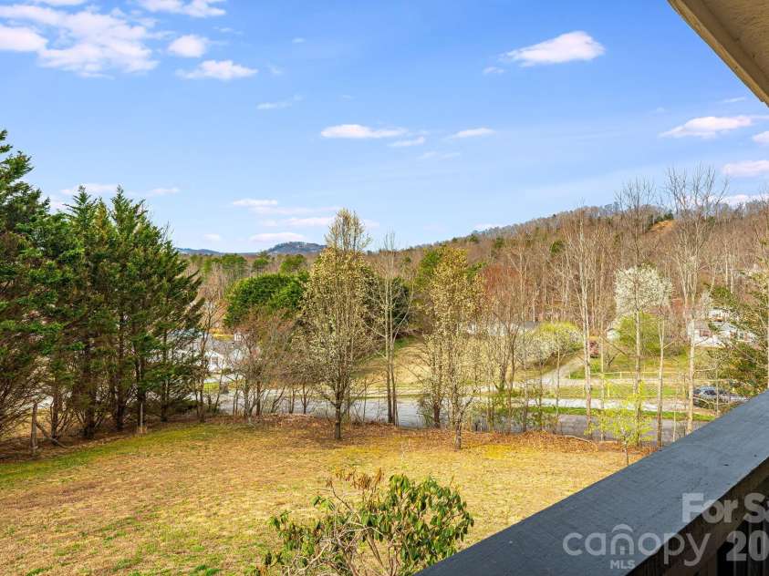 217 Sandy Creek Court, Hendersonville, NC 28792.  MLS# CAR4356536, YatesRealty ID 4104. Backyard