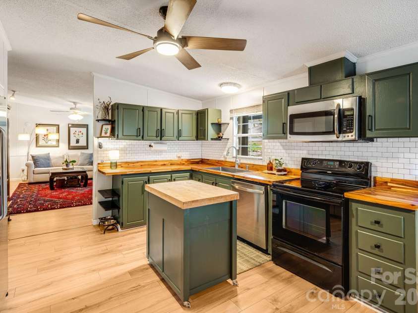 217 Sandy Creek Court, Hendersonville, NC 28792.  MLS# CAR4356536, YatesRealty ID 4104. Kitchen 