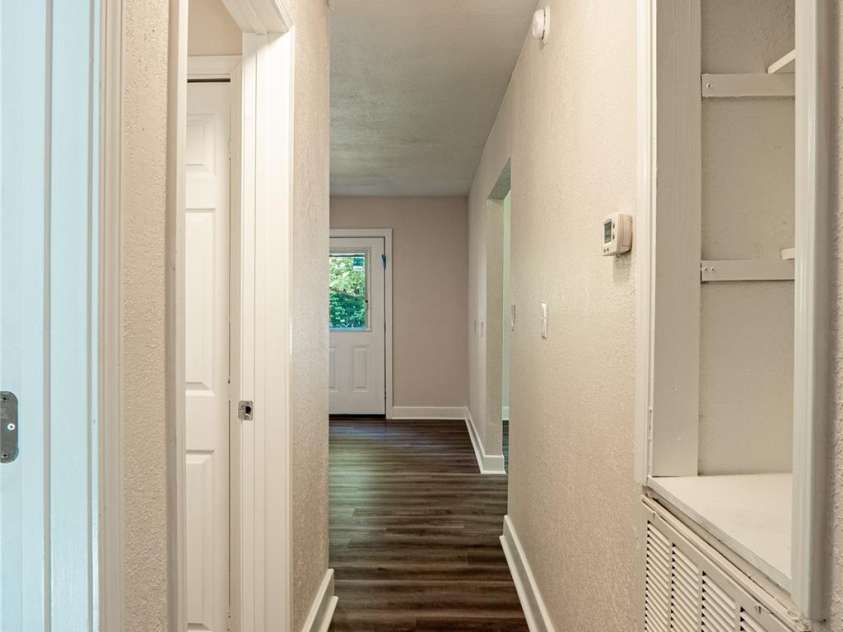 3080 Whitesides Road, Forest City, NC 28139.  MLS# CAR4406790, YatesRealty ID 41050. Hall from Bedrooms to Kitchen