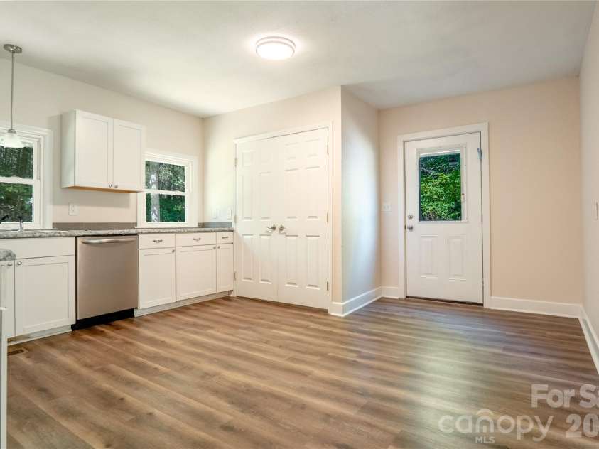 3080 Whitesides Road, Forest City, NC 28139.  MLS# CAR4406790, YatesRealty ID 41050. Laundry Closet in Kitchen