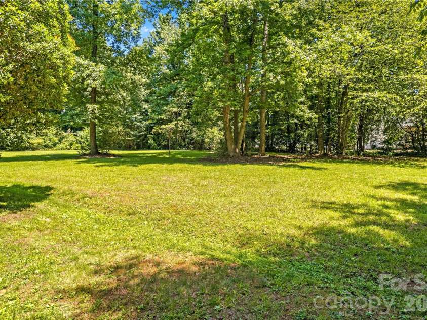 203 Wickersham Drive, Statesville, NC 28625.  MLS# CAR4402525, YatesRealty ID 41062. 203 Wickersham open backyard area