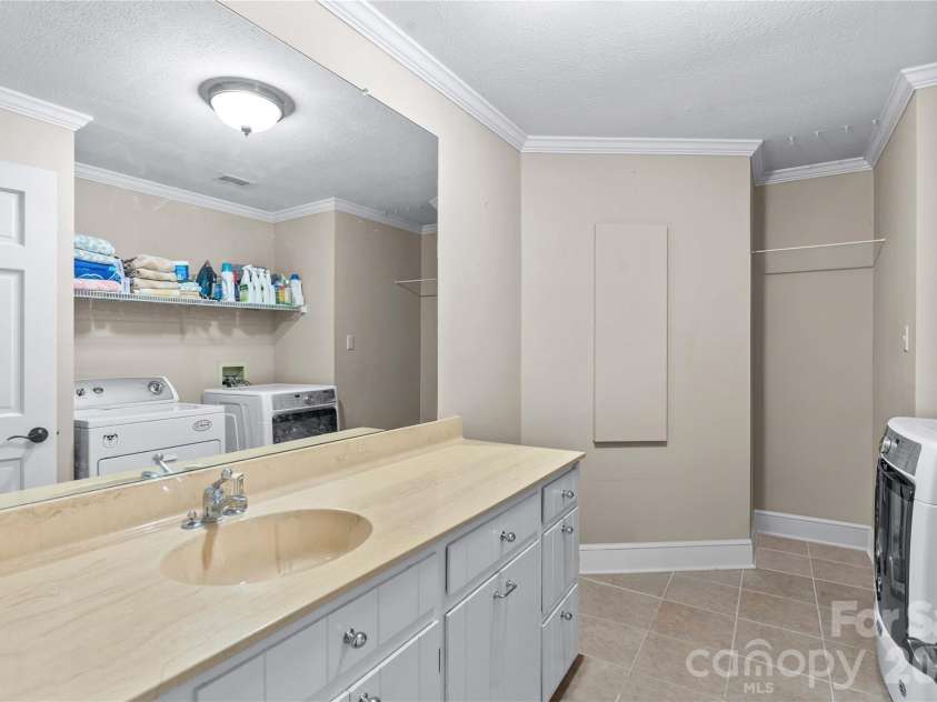 203 Wickersham Drive, Statesville, NC 28625.  MLS# CAR4402525, YatesRealty ID 41062. Laundry Room