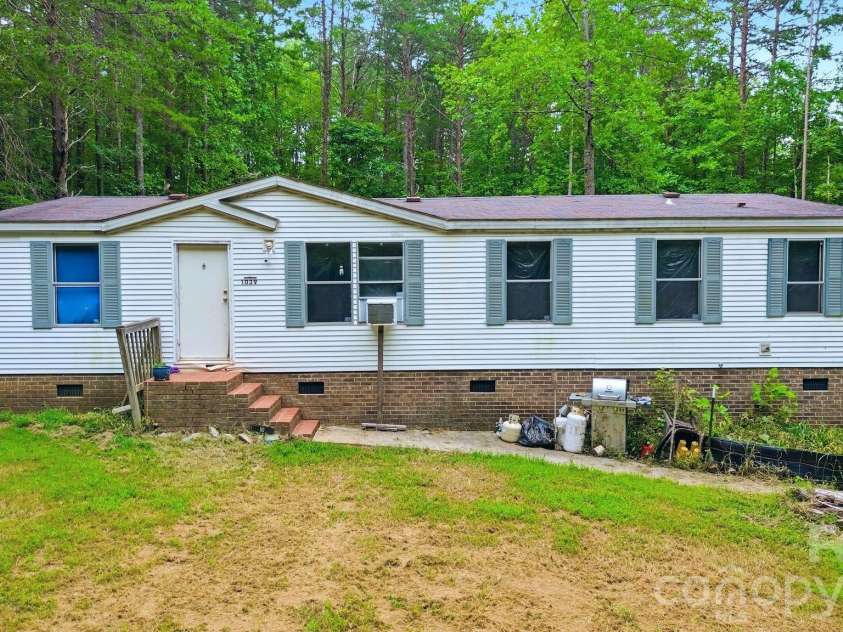 1039 Monterey Drive, Iron Station, NC 28080.  MLS# CAR4410603, YatesRealty ID 41064. 