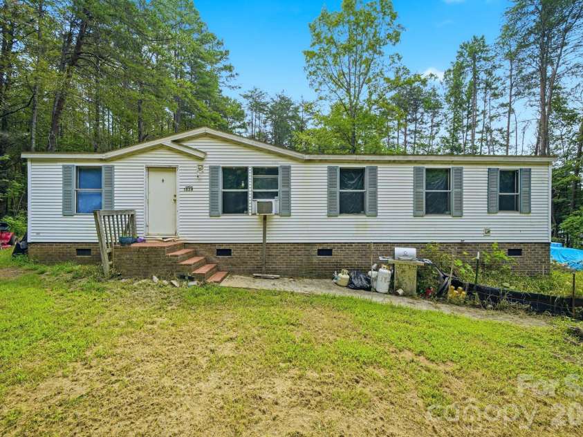 1039 Monterey Drive, Iron Station, NC 28080.  MLS# CAR4410603, YatesRealty ID 41064. 