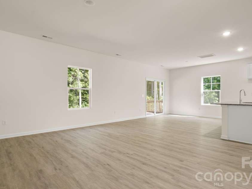 4022 Rolling Creek Road, Vale, NC 28168.  MLS# CAR4390215, YatesRealty ID 41072. Living Room to Kitchen