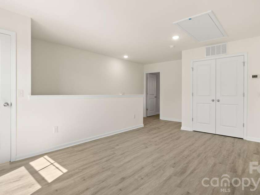 4022 Rolling Creek Road, Vale, NC 28168.  MLS# CAR4390215, YatesRealty ID 41072. Loft area and laundry closet