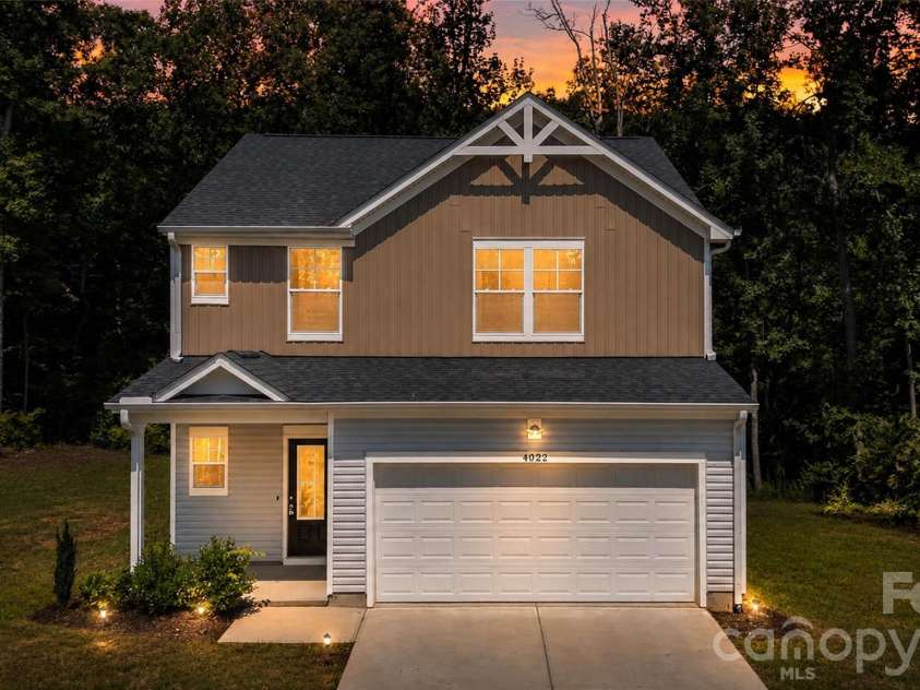 4022 Rolling Creek Road, Vale, NC 28168.  MLS# CAR4390215, YatesRealty ID 41072. Twilight Front of House