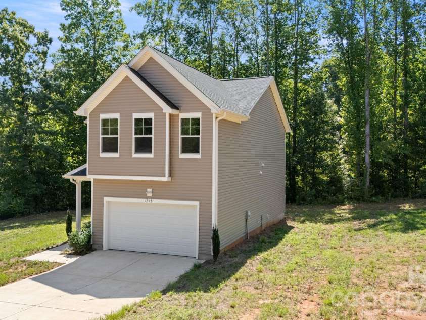 4029 Rolling Creek Drive, Vale, NC 28168.  MLS# CAR4390263, YatesRealty ID 41073. Front exterior and Side