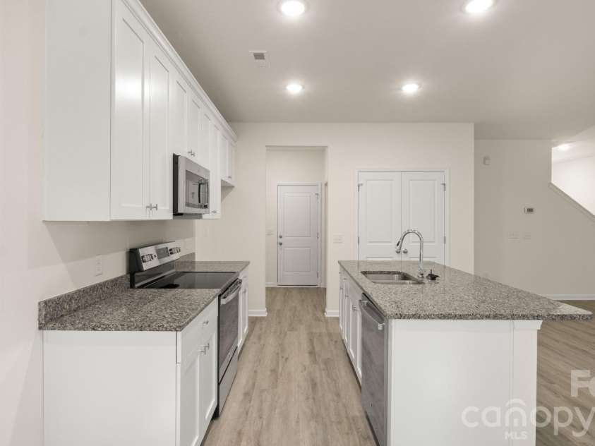 4029 Rolling Creek Drive, Vale, NC 28168.  MLS# CAR4390263, YatesRealty ID 41073. Kitchen to Living